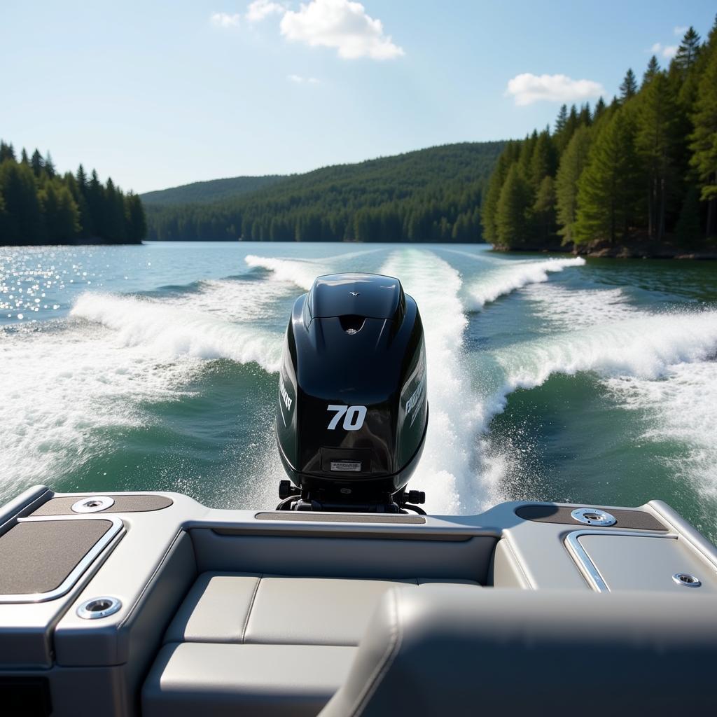 A 70 HP Evinrude outboard motor propelling a boat across a lake at high speed.