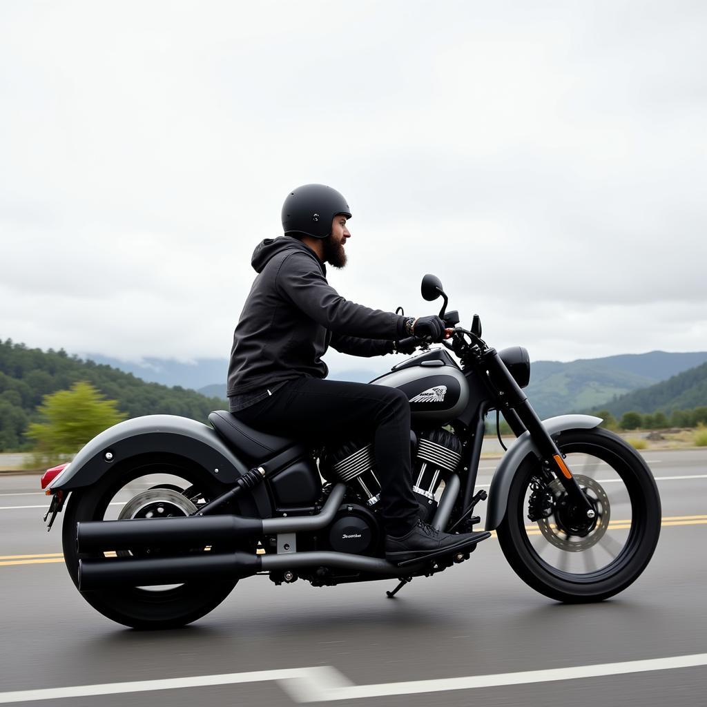 Riding the Indian Chief Bobber Dark Horse on a scenic highway